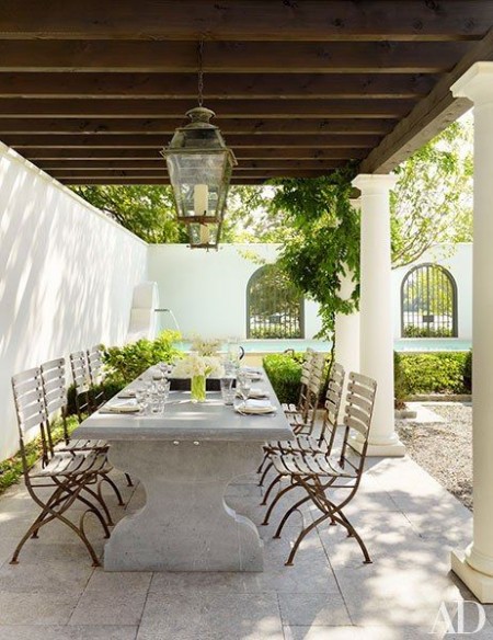 6. outdoor dining stone table with wooden chairs Matthew