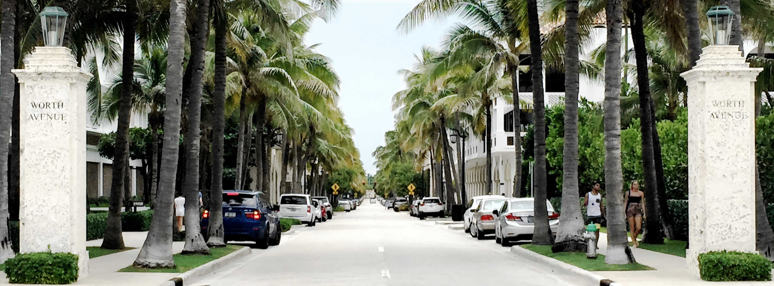 Street View - Limestone columns and palm trees - Worth Ave - Matthew Murrey  Design