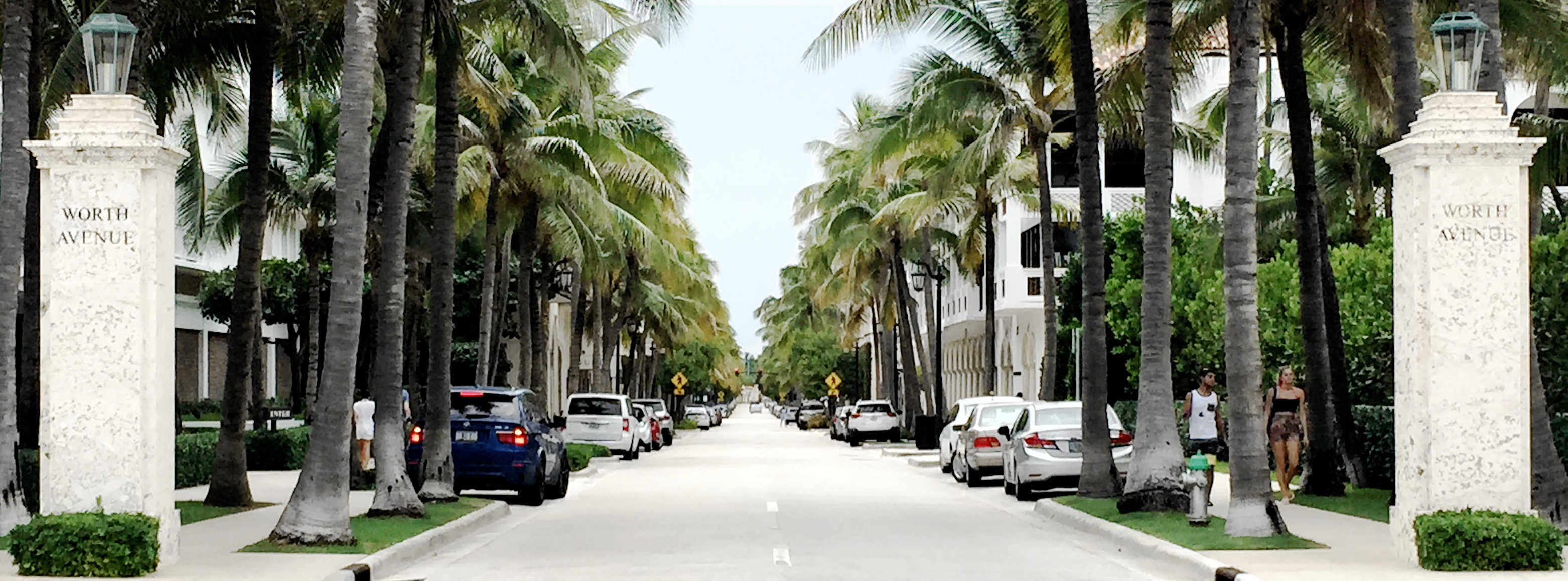 Street View - Limestone columns and palm trees - Worth Ave