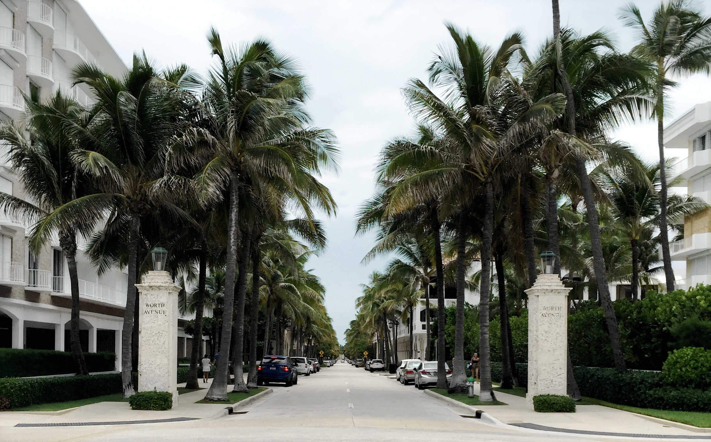 Street View - Limestone columns and palm trees - Worth Ave
