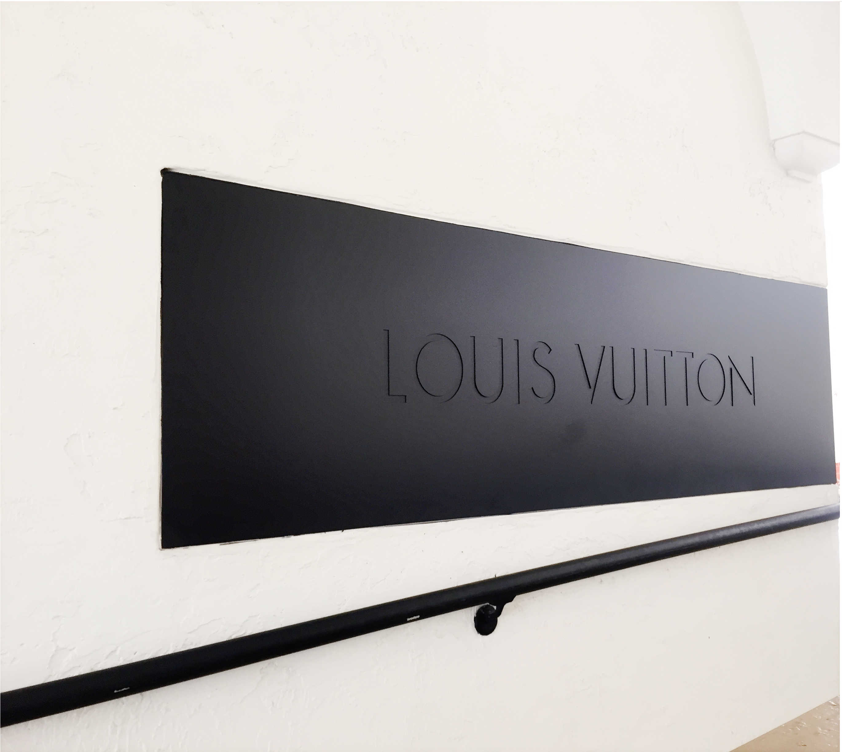 Corten Steel Louis Vuitton Signage - Worth Ave, Palm Beach - Landscape Design